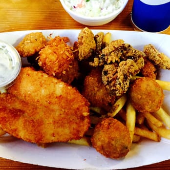 Shrimp N Stuff - Seafood platter is great! Fried shrimp, fish filet, oysters, amazing crab balls over great fries, hush puppies and cole slaw. - Seafood Near Me - Galveston, Texas Shrimp N Stuff - Seafood platter is great! Fried shrimp, fish filet, oysters, amazing crab balls over great fries, hush puppies and cole slaw. - Seafood Near Me - Galveston, Texas