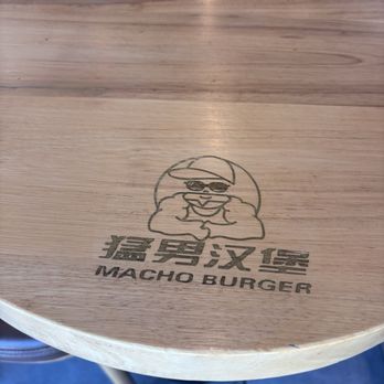 Swagyu Burger - Cool table with Macho Burger engraving - Burgers Near Me - Newport Beach, California