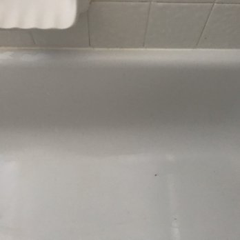 Tubby's Tub & Tile - Before, lots of worn away areas - Refinishing Services Near Me Tubby's Tub & Tile - Before, lots of worn away areas - Refinishing Services Near Me