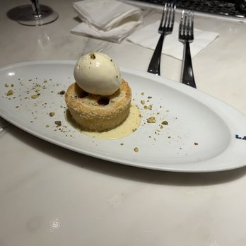Lago - Lemon cake with sweet grapes in the middle and vanilla gelato on top! - Italian Near Me - Las Vegas, Nevada Lago - Lemon cake with sweet grapes in the middle and vanilla gelato on top! - Italian Near Me - Las Vegas, Nevada