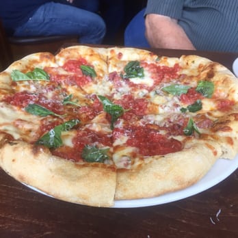 OneSpeed - Yummy salami, basil and cheese pizza with fresh tomatoes - Italian Near Me - Sacramento, California