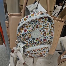 Winners - Hey, a floral Kipling sling!