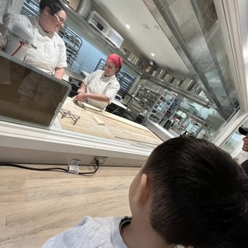 One House Bakery - Zane watching lovely ladies roll dough! - Bakeries Near Me - Benicia, California One House Bakery - Zane watching lovely ladies roll dough! - Bakeries Near Me - Benicia, California
