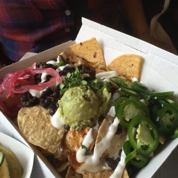Lloyd Taco Factory - Tricked out Nachos with black beans - Tacos Near Me - Buffalo, New York Lloyd Taco Factory - Tricked out Nachos with black beans - Tacos Near Me - Buffalo, New York