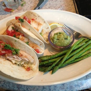 Bahama Breeze - Fish taco...looks good but it tasted kind of bland. - Seafood Near Me - Raleigh, North Carolina Bahama Breeze - Fish taco...looks good but it tasted kind of bland. - Seafood Near Me - Raleigh, North Carolina