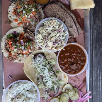Interstellar BBQ - Pork taco, brisket taco, beans, jalapeño slaw and potato salad. Side of homemade tortillas. - Barbeque Near Me - Austin, Texas Interstellar BBQ - Pork taco, brisket taco, beans, jalapeño slaw and potato salad. Side of homemade tortillas. - Barbeque Near Me - Austin, Texas