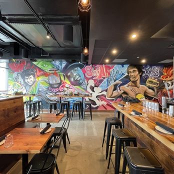 Shōjō Cambridge - The Bruce Lee and Jackie Chan mural really livened up the modern atmosphere! - Asian Fusion Near Me - Cambridge, Massachusetts