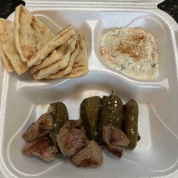 The Pyramids - Lamb Kabob plate with grape leaves - Food Trucks Near Me The Pyramids - Lamb Kabob plate with grape leaves - Food Trucks Near Me