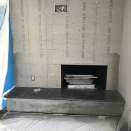 The fireplace before any work was done.