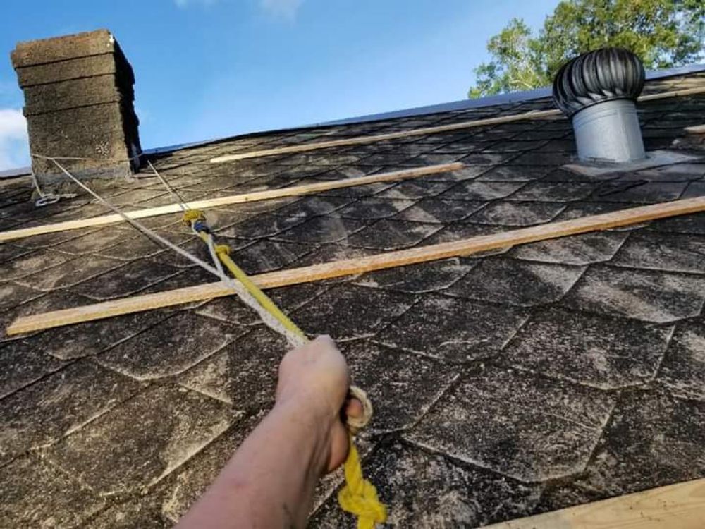 Slide of Armands Roofing