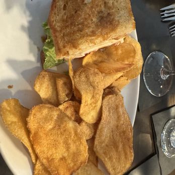 The Standard on Vaughan - 1/2 of a club sandwich with house chips - Cocktail Bars Near Me - Bertram, Texas