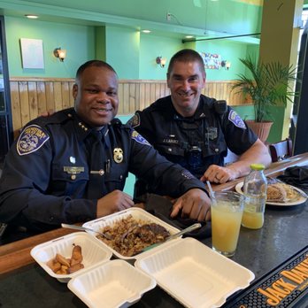 Caribbean Heritage Catering Services - Chief Singletary and Officer Laruez enjoying their jerk chicken. Not more donuts. #MightyGoodFood from Caribbean Heritage. - Caterers Near Me - Rochester, New York Caribbean Heritage Catering Services - Chief Singletary and Officer Laruez enjoying their jerk chicken. Not more donuts. #MightyGoodFood from Caribbean Heritage. - Caterers Near Me - Rochester, New York