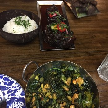 Cane - crispy kale in the front, rice and oxtail int he back - Trinidadian Near Me - Washington, DC, District of Columbia Cane - crispy kale in the front, rice and oxtail int he back - Trinidadian Near Me - Washington, DC, District of Columbia