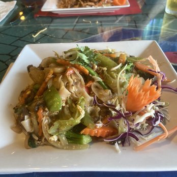 Blue Sake - Drunken Noodle-veg. And pad thai in the background. - Asian Fusion Near Me - Dunedin, Florida