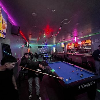 Playas Bar - people playing pool in a bar - Bars Near Me - Fullerton, California