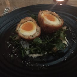 Scotch eggs with scallops and squid at Laughing Gravy. Scotch eggs with scallops and squid at Laughing Gravy.