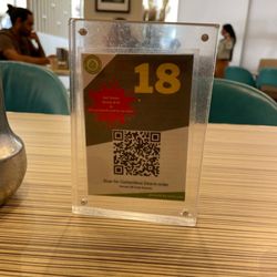Saravanaa Bhavan Sydney - QR code on each table to order food and drinks.