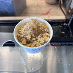 Big Softie - Petit cup of vanilla soft serve with a cookie butter hardshell and cornflake streusel