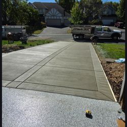 Joseph Construction of St. Paul - Broom finish driveway with borders in Eden Prairie