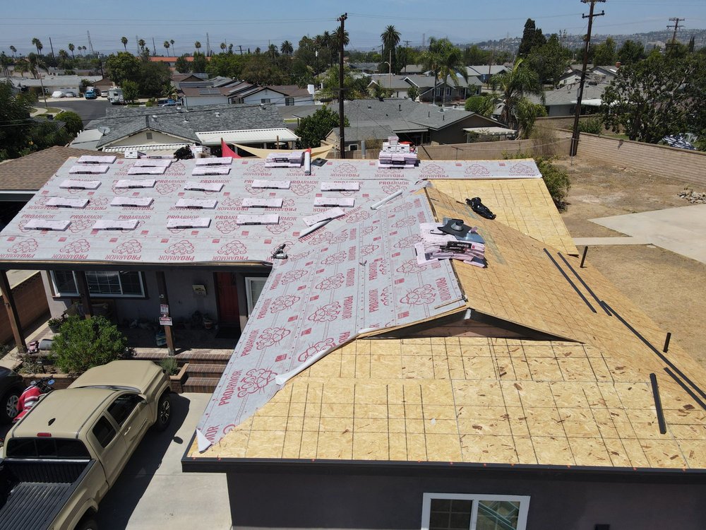 Slide of The Roofing Company