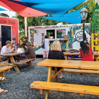 Sweet Hula - a group of people sitting at picnic tables - Acai Bowls Near Me - Kihei , Hawaii Sweet Hula - a group of people sitting at picnic tables - Acai Bowls Near Me - Kihei , Hawaii