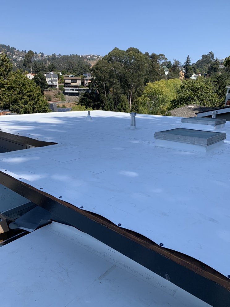 Slide of Ortiz Roofing