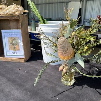 Dragon Delights - a vase of flowers on a table - Organic Stores Near Me - Ramona, California Dragon Delights - a vase of flowers on a table - Organic Stores Near Me - Ramona, California