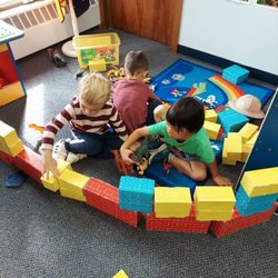 Christ the King Lutheran Church and Preschool - Building with blocks and Dinosaurs