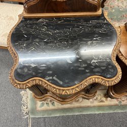 Old Covina Antique Emporium - The top of night stand
