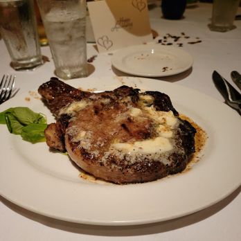 The Capital Grille - 22 oz bone in ribeye with garlic butter added - Steakhouses Near Me - Cincinnati, Ohio The Capital Grille - 22 oz bone in ribeye with garlic butter added - Steakhouses Near Me - Cincinnati, Ohio
