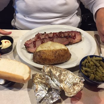 Buzz's BBQ & Steakhouse - Brisket and trimming - Barbeque Near Me - Nevada, Missouri