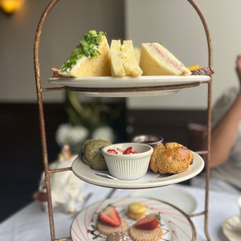 Chado Tea Room - Tray of deliciousness - tea sandwiches on top, scones with clotted cream and jam, butter cookies and macarons - Tea Rooms Near Me - Pasadena, California Chado Tea Room - Tray of deliciousness - tea sandwiches on top, scones with clotted cream and jam, butter cookies and macarons - Tea Rooms Near Me - Pasadena, California