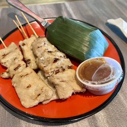 Block 9 Thai Street Eats - Pork skewers with sticky rice.