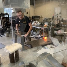 The beginning of the glass blowing process for a standard round ornament. The beginning of the glass blowing process for a standard round ornament.