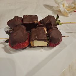 Dessert: chocolate covered strawberries and cheese cake Dessert: chocolate covered strawberries and cheese cake