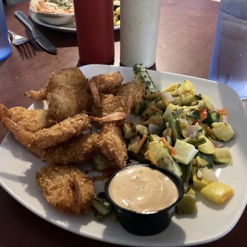 Miller's Waterfront Restaurant - Coconut Shrimp with Squash Medley - Seafood Near Me - Nags Head, North Carolina Miller's Waterfront Restaurant - Coconut Shrimp with Squash Medley - Seafood Near Me - Nags Head, North Carolina