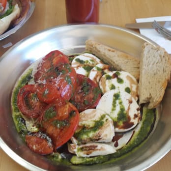 Main Kitchen Cafe - Roasted tomatoes caprese with a side of country toast - New American Near Me - Granada Hills, California