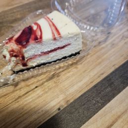 Slice White Chocolate Raspberry Cheesecake