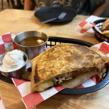 Aloha Mamacita - Birria Crunch Wrap with Consomme - Mexican Near Me - Honolulu, Hawaii Aloha Mamacita - Birria Crunch Wrap with Consomme - Mexican Near Me - Honolulu, Hawaii