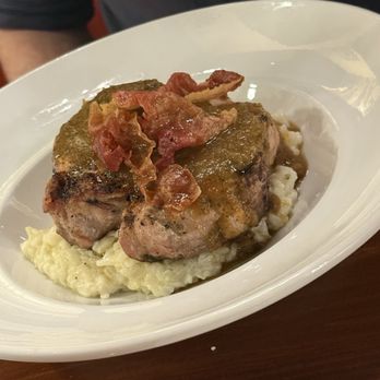 Harvey Johns Steakhouse - Bacon wrapped pork loin over risotto - Steakhouses Near Me - Angier, North Carolina Harvey Johns Steakhouse - Bacon wrapped pork loin over risotto - Steakhouses Near Me - Angier, North Carolina