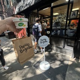 Exterior outside entrance of PopUp Bagels - 3 bagel combo with scallion cream cheese - New York, New York Exterior outside entrance of PopUp Bagels - 3 bagel combo with scallion cream cheese - New York, New York