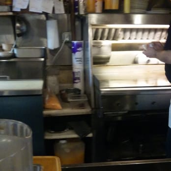 Howell's Restaurant & Lounge - A grill view and Cook Extraordinare; Jerry - Lounges Near Me - Oregon City, Oregon