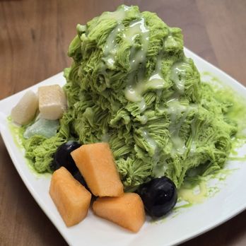 Frostcity - Green tea with condensed milk drizzle. Cantaloupe, grapes and mochi. - Desserts Near Me - Honolulu, Hawaii