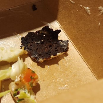 Savage Tacos Truck - Big piece of burnt cheese from the Carne asada fries - Food Trucks Near Me Savage Tacos Truck - Big piece of burnt cheese from the Carne asada fries - Food Trucks Near Me