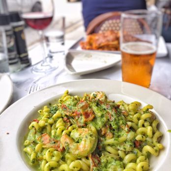 Caffe Luna Rosa - Fusilli Shrimp Pesto Genovese $28.00 Sauteed gulf shrimp tossed w/house made basil pesto, sun dried tomatoes, fresh fusilli pasta and cream - Italian Near Me - Delray Beach, Florida