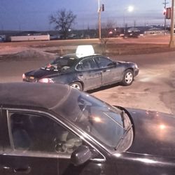 Jimmy's Pizza - Employee vehicles.