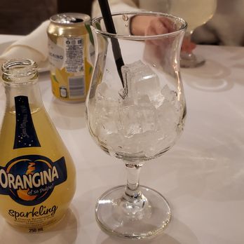 Del Posto Italian Kitchen - a glass of water and a bottle of wine - Italian Near Me - Edmonton, Alberta