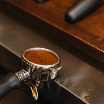 Farmhouse Coffee - a espressor being filled with coffee - Coffee & Tea Near Me - Cleveland, Georgia Farmhouse Coffee - a espressor being filled with coffee - Coffee & Tea Near Me - Cleveland, Georgia