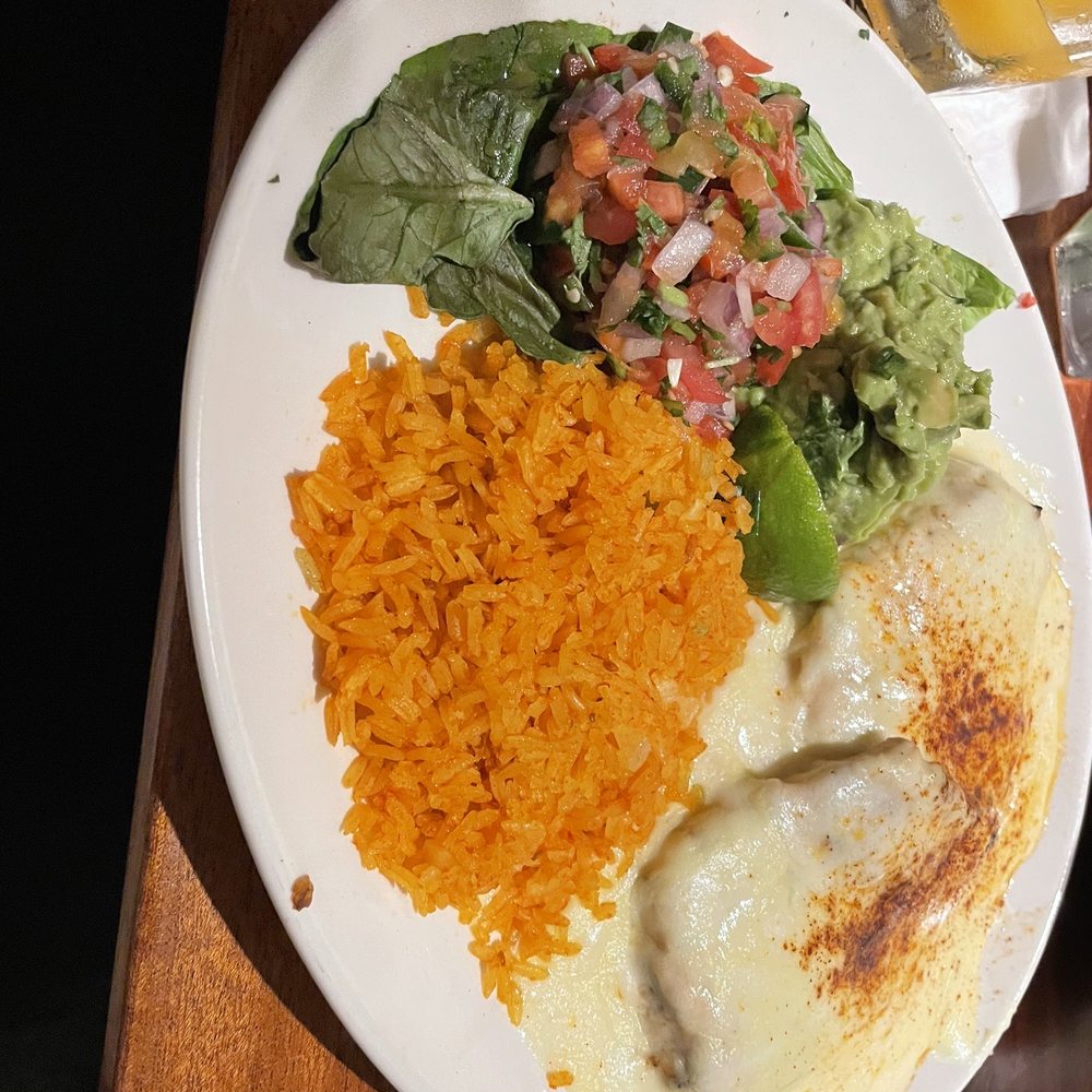 Sour cream, chicken, with rice, pico, and guac. Sour cream, chicken, with rice, pico, and guac.