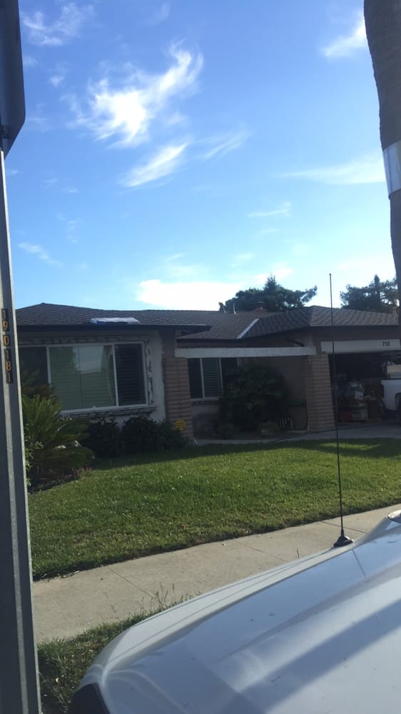 Slide of Landmark Roofing